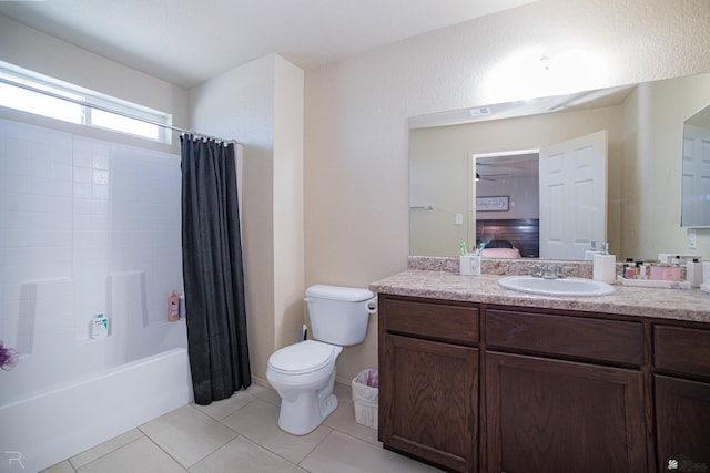7850 E 44th Pl, Yuma, AZ 85365 - ensuite bathroom featuring connected bathroom, vanity, toilet, tile patterned floors, and shower / bath combo with shower curtain