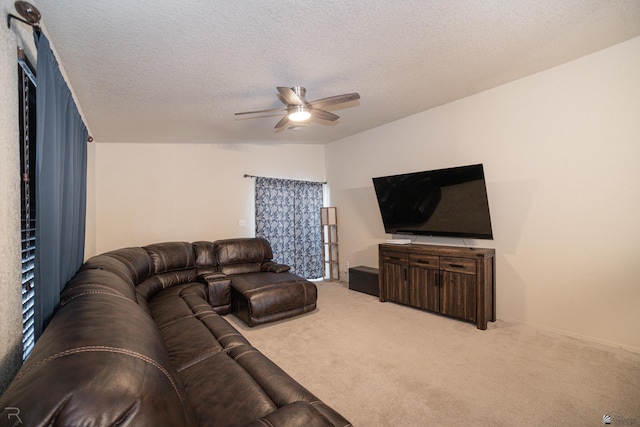 7850 E 44th Pl, Yuma, AZ 85365 - carpeted living room featuring a ceiling fan and a textured ceiling