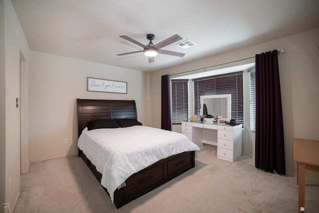 7850 E 44th Pl, Yuma, AZ 85365 - bedroom featuring visible vents, ceiling fan, and light carpet
