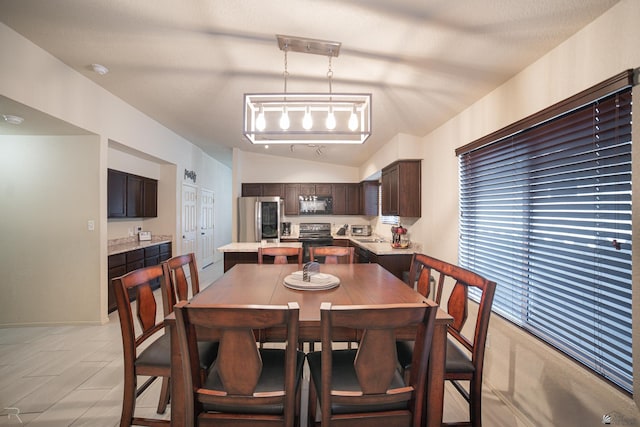 7850 E 44th Pl, Yuma, AZ 85365 - dining space featuring lofted ceiling