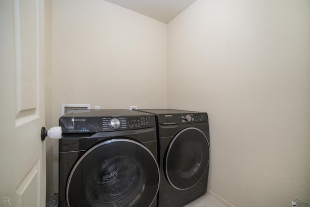 7850 E 44th Pl, Yuma, AZ 85365 - laundry area with separate washer and dryer, laundry area, and baseboards