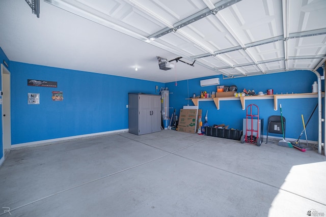 7850 E 44th Pl, Yuma, AZ 85365 - garage with baseboards, a wall unit AC, and a garage door opener
