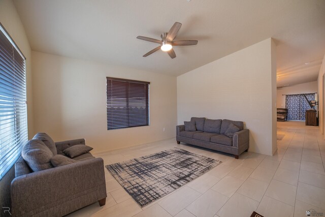 7850 E 44th Pl, Yuma, AZ 85365 - living area featuring a ceiling fan, light tile patterned floors, and lofted ceiling