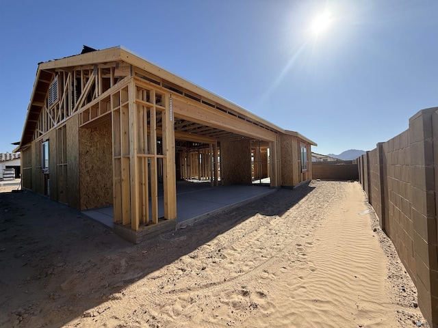 12603 E 51st Pl, Yuma, AZ 85367 - view of side of home featuring a fenced backyard