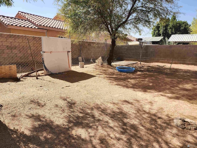 view of yard featuring a fenced backyard