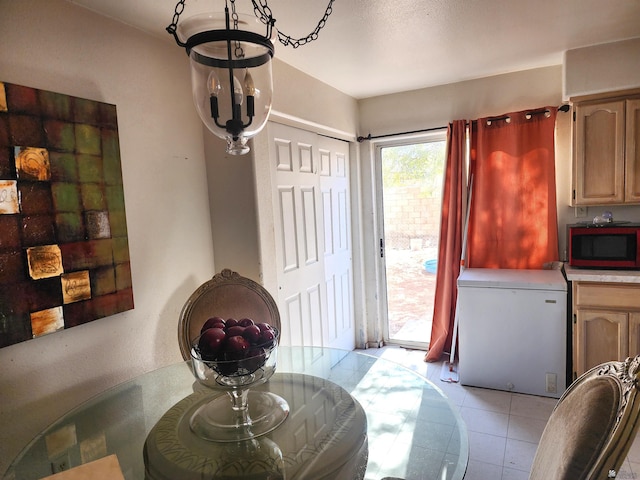 dining room featuring light tile patterned floors