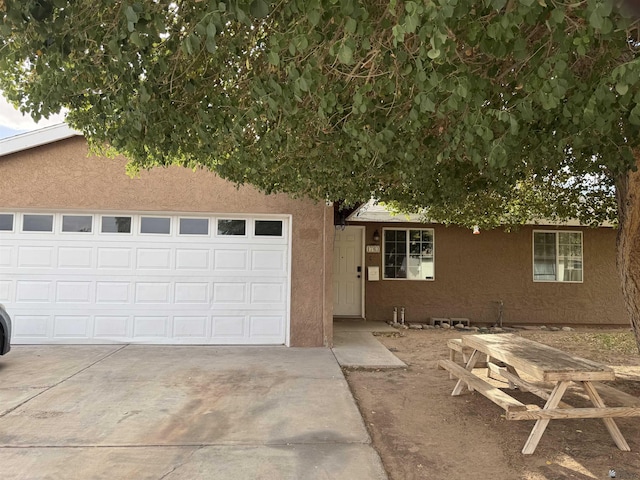 1763 W 24th Dr, Yuma, AZ 85364 - view of front facade with stucco siding and driveway