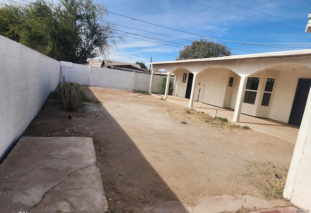 view of yard with a patio and a fenced backyard