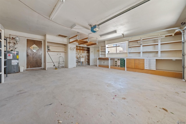 1228 S 40th Dr, Yuma, AZ 85364 - garage with electric water heater and a garage door opener