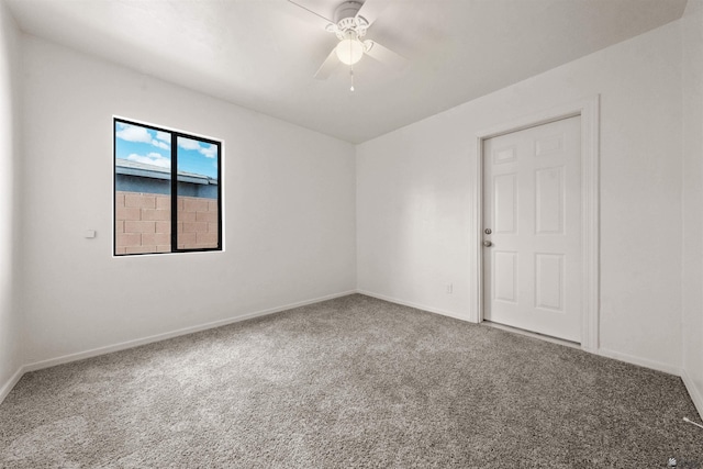 321 S 23rd Ave, Yuma, AZ 85364 - spare room with ceiling fan, baseboards, and carpet