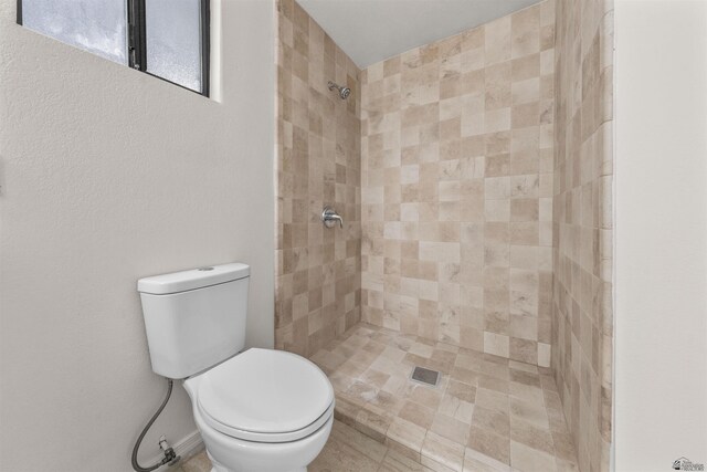 321 S 23rd Ave, Yuma, AZ 85364 - full bathroom with a tile shower and toilet