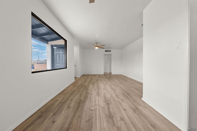 321 S 23rd Ave, Yuma, AZ 85364 - interior space with a ceiling fan, baseboards, visible vents, and wood finished floors