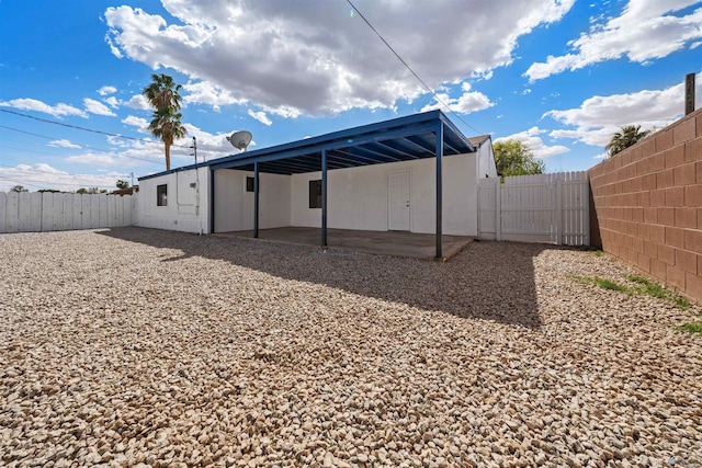 321 S 23rd Ave, Yuma, AZ 85364 - view of yard with a fenced backyard, a carport, and a patio area