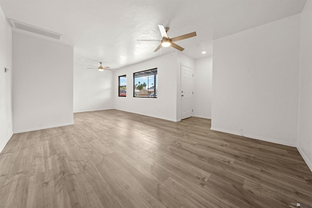 321 S 23rd Ave, Yuma, AZ 85364 - interior space featuring ceiling fan, wood finished floors, and visible vents