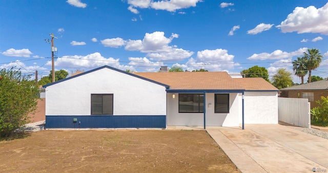 321 S 23rd Ave, Yuma, AZ 85364 - view of front facade featuring fence and stucco siding