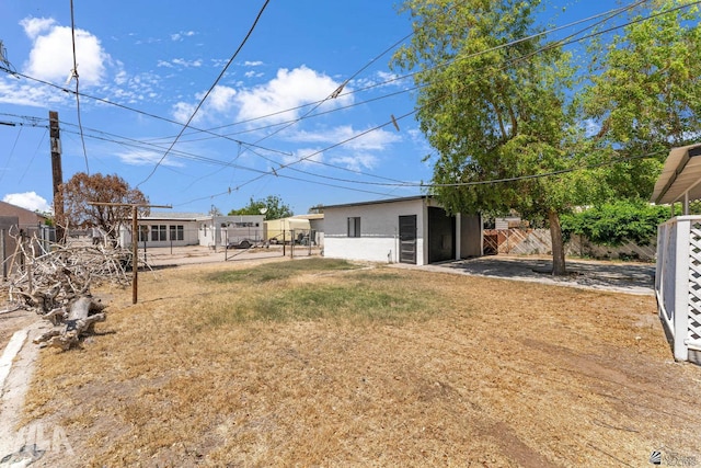 view of yard featuring fence