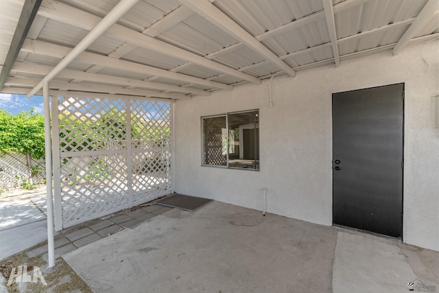 view of patio featuring fence