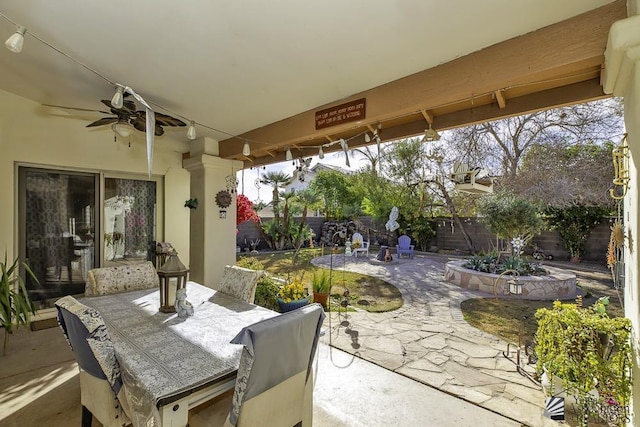 2877 W 13th Pl, Yuma, AZ 85365 - view of patio featuring outdoor dining area, a fenced backyard, and ceiling fan