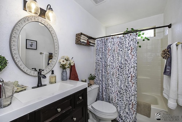 2877 W 13th Pl, Yuma, AZ 85365 - full bathroom with visible vents, shower / bath combo, toilet, and vanity