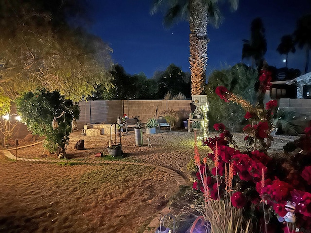 2877 W 13th Pl, Yuma, AZ 85365 - yard at night featuring fence