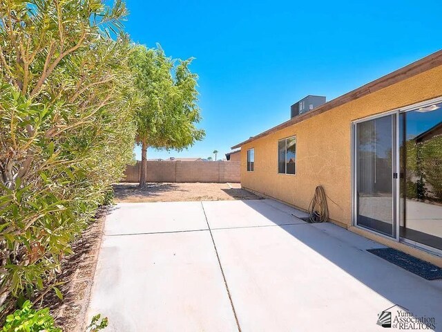 8576 E 38th St, Yuma, AZ 85365 - fenced backyard featuring a patio area