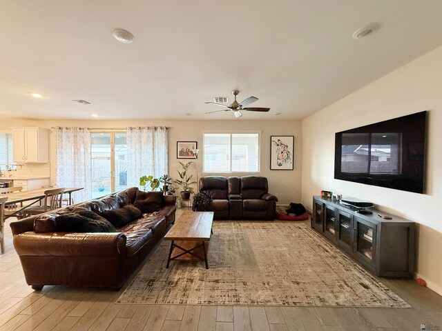 14650 E 42nd Pl, Yuma, AZ 85367 - living area featuring light wood finished floors, a ceiling fan, and recessed lighting