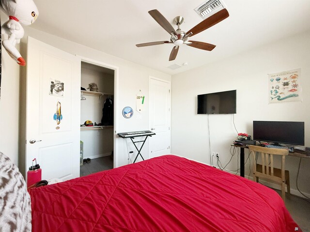 14650 E 42nd Pl, Yuma, AZ 85367 - bedroom with ceiling fan, a closet, and a walk in closet
