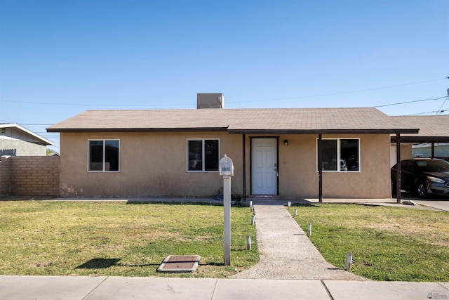 single story home with stucco siding and a shingled roof