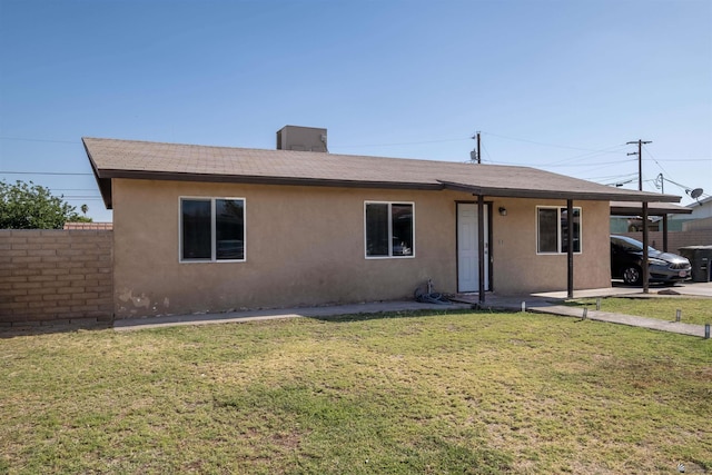 ranch-style house with stucco siding