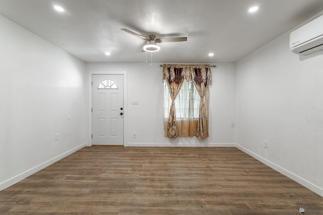 3566 W 5th St, Yuma, AZ 85364 - entryway with a wall mounted air conditioner, recessed lighting, a ceiling fan, baseboards, and wood finished floors