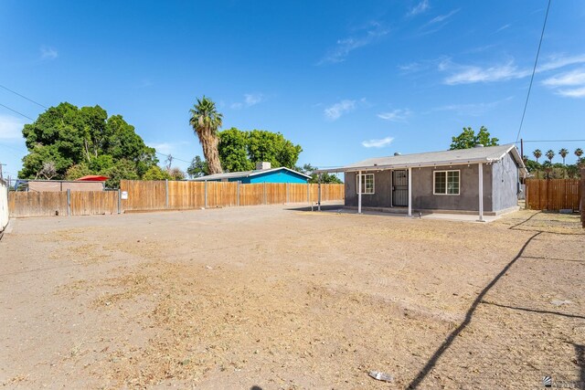3566 W 5th St, Yuma, AZ 85364 - fenced backyard featuring a patio area
