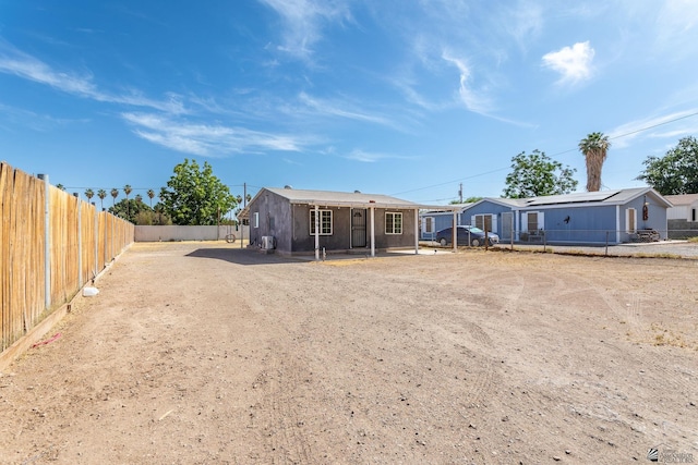 3566 W 5th St, Yuma, AZ 85364 - rear view of house featuring a fenced backyard and a patio
