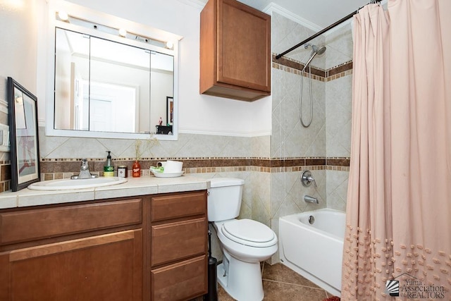 4539 W 17th St, Yuma, AZ 85364 - bathroom featuring vanity, shower / bath combination with curtain, toilet, tile patterned floors, and tile walls