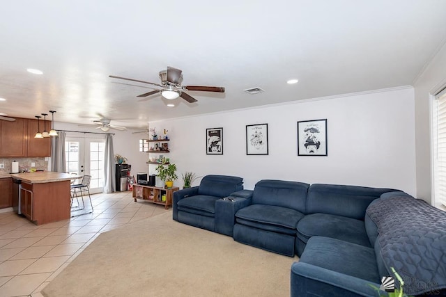 4539 W 17th St, Yuma, AZ 85364 - living room with ceiling fan, recessed lighting, light tile patterned floors, french doors, and ornamental molding