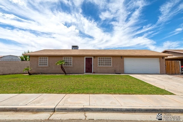 4539 W 17th St, Yuma, AZ 85364 - ranch-style home featuring a garage, concrete driveway, and stucco siding