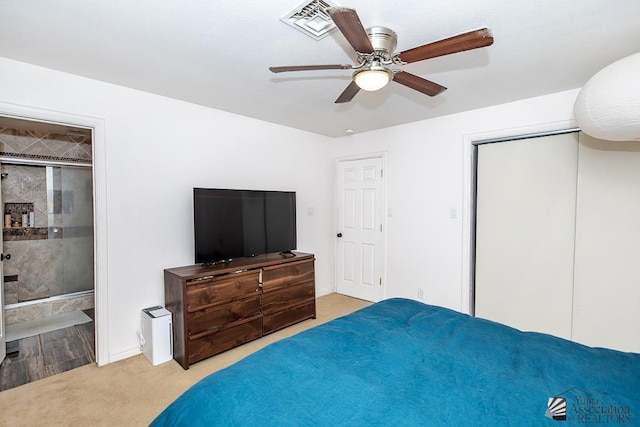 4539 W 17th St, Yuma, AZ 85364 - bedroom with carpet flooring, ceiling fan, connected bathroom, and a closet