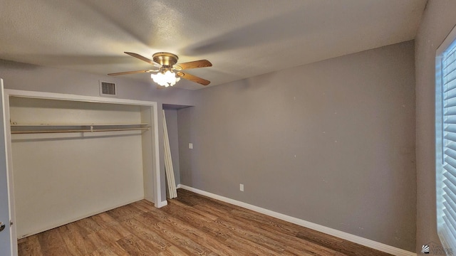 1350 S 6th Ave, Yuma, AZ 85364 - unfurnished bedroom featuring wood finished floors, a closet, and ceiling fan