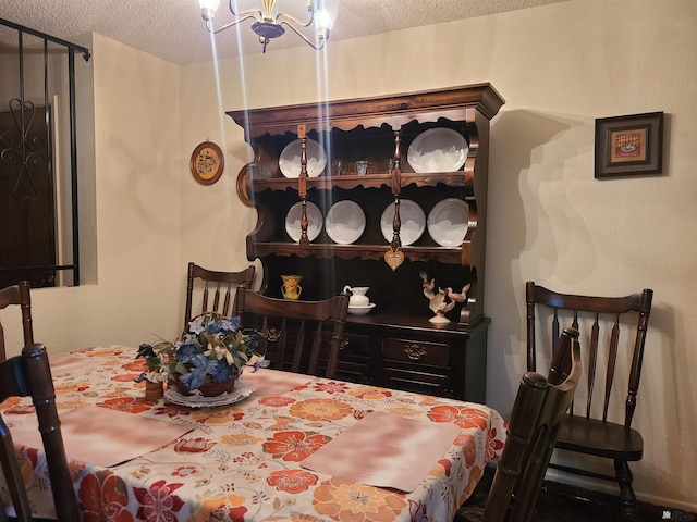 2045 S 14th Ave # 79, Yuma, AZ 85364 - dining room with a textured ceiling and a chandelier