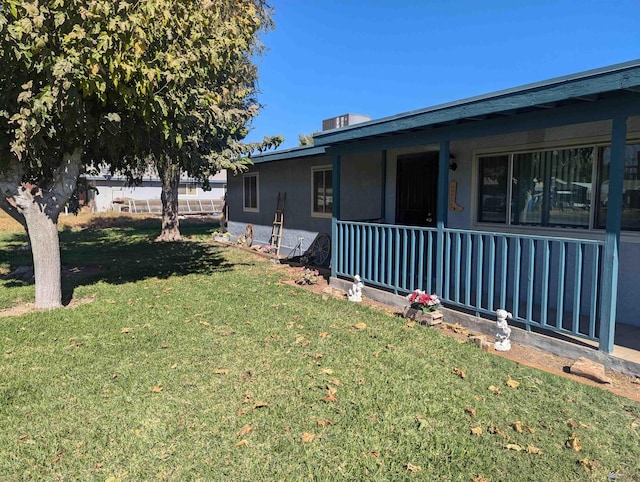 view of property exterior with a yard