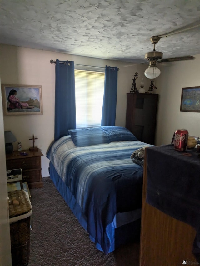 bedroom featuring dark colored carpet