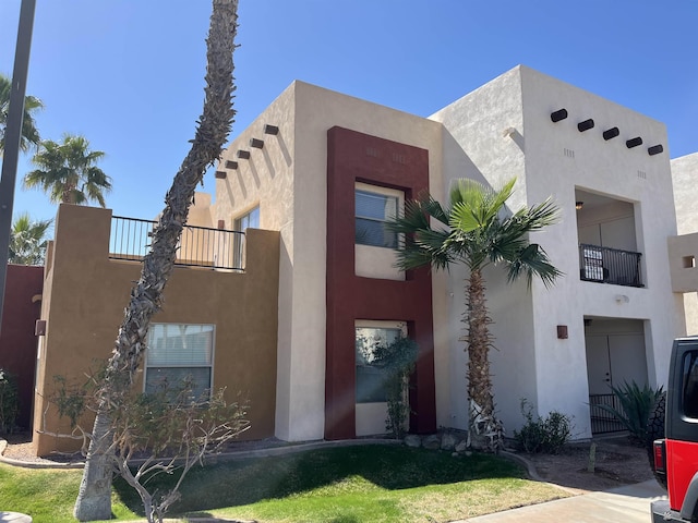 view of front of home featuring stucco siding
