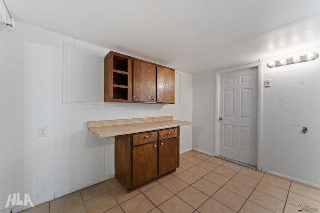 3186 S Elm St, Yuma, AZ 85364 - kitchen featuring open shelves, light countertops, and light tile patterned floors