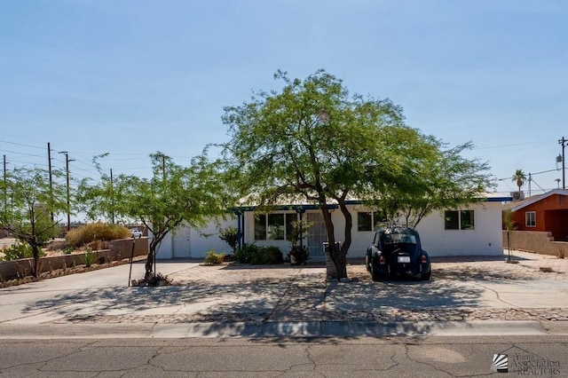 3186 S Elm St, Yuma, AZ 85364 - obstructed view of property featuring concrete driveway
