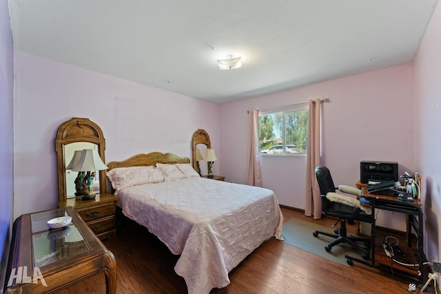 3186 S Elm St, Yuma, AZ 85364 - bedroom featuring wood finished floors and a desk