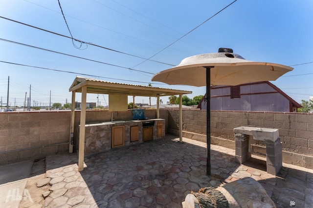 3186 S Elm St, Yuma, AZ 85364 - fenced backyard featuring area for grilling and a patio