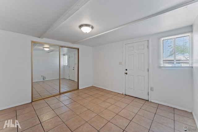 3186 S Elm St, Yuma, AZ 85364 - foyer entrance featuring light tile patterned floors and beam ceiling
