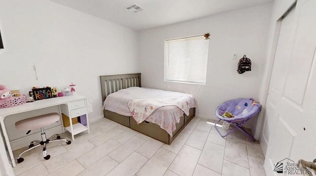 bedroom featuring visible vents