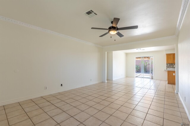 1986 S 47th Ave, Yuma, AZ 85364 - empty room with crown molding, ceiling fan, light tile patterned floors, and baseboards