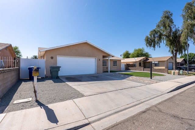 1986 S 47th Ave, Yuma, AZ 85364 - ranch-style home featuring an attached garage, driveway, and stucco siding