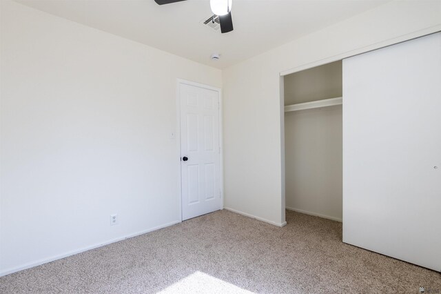 1986 S 47th Ave, Yuma, AZ 85364 - unfurnished bedroom with carpet flooring, a closet, ceiling fan, and baseboards